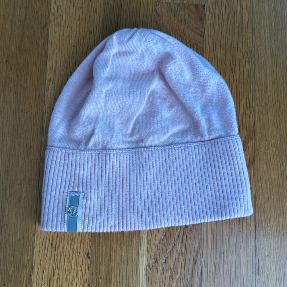 Pink Lululemon beanie with ponytail hole